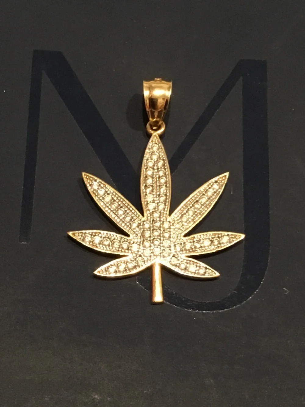 14 kt gold pendant marijuana leaf cz stones iced out 4 grams
